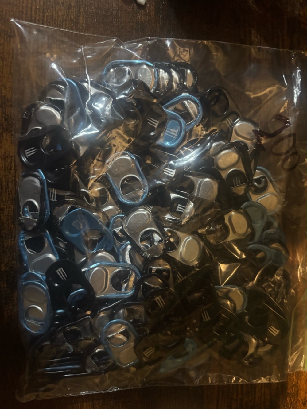 200 Monster Can Pull Tabs in Black, Blue and Some Red